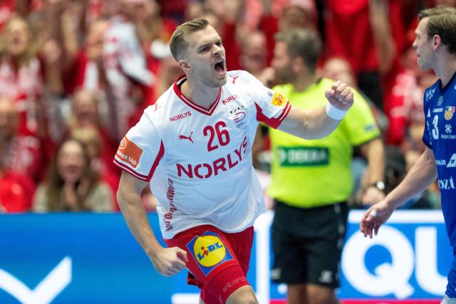 Denmark's right winger #26 Johan Hansen celebrates after scoring during the men's EHF Euro 2026 semi-finals handball match Denmark vs Iceland in Herning, Denmark, on January 30, 2026. (Photo by Bo Amstrup / Ritzau Scanpix / AFP) / Denmark OUT