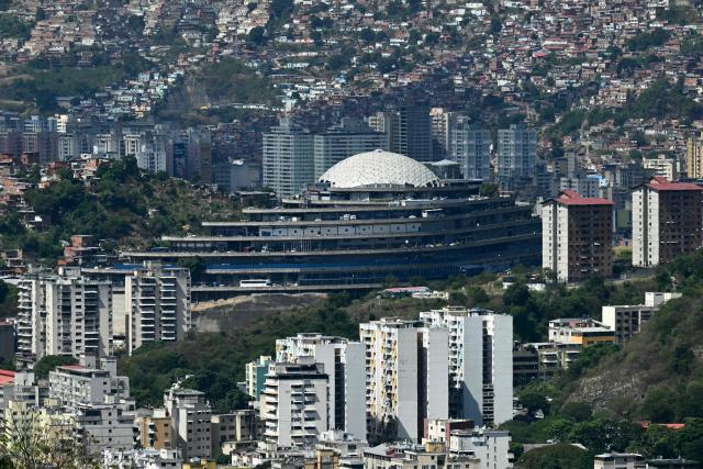 (FILES) This image shows El Helicoide -a facility and prison owned by the Venezuelan government and used for both regular and political prisoners of the Bolivarian National Intelligence Service (SEBIN)- in Caracas on January 8, 2026. Venezuela's interim President Delcy Rodriguez announced on January 30, 2026, the closure of the notorious Helicoide prison in Caracas, which has been denounced as a torture centre by the opposition and human rights activists. (Photo by RONALDO SCHEMIDT / AFP)