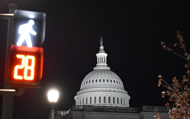 View of the US Capitol in Washington, DC, on January 30, 2026. US senators on January 30 approved a last-minute deal backed by President Donald Trump to avert the worst impacts of an imminent government shutdown, after Democratic anger over the killing of two protesters by immigration agents derailed funding talks. (Photo by Alex WROBLEWSKI / AFP)