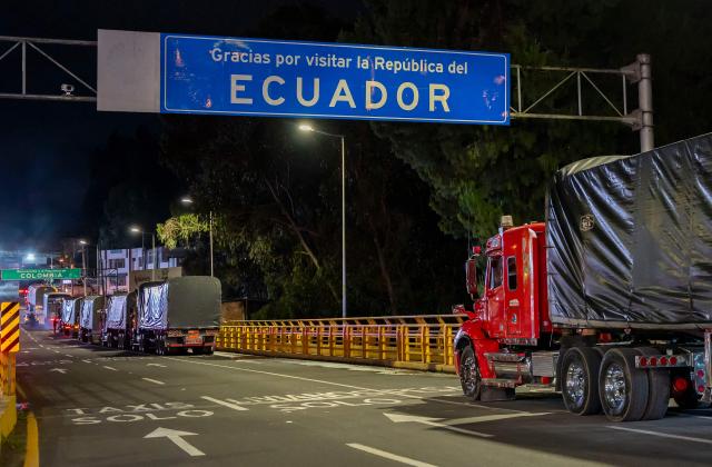 Trucks queue at the border between Ecuador and Colombia on the eve of the new tariff measures imposed by the Ecuadorian government coming into effect in Tulcan, Ecuador on January 30, 2026. The countries imposed 30% tariffs on each other after Ecuador's President Daniel Noboa accused Colombia of not doing enough to combat drug trafficking along their shared border. The dispute escalated when Colombia suspended electricity sales to Ecuador, and Ecuador raised the tariff for transporting crude oil through its pipeline by 900%. (Photo by Reicarmyr CANIZARES / AFP)