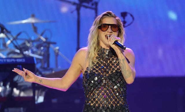 US singr-songwriter Kesha performs on stage during Musicares Person of the Year 2026 at the LA Convention Center in Los Angeles on January 30, 2026. (Photo by Michael Tran / AFP)