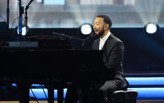US singer-Songwriter John Legend performs on stage during Musicares Person of the Year 2026 at the LA Convention Center in Los Angeles on January 30, 2026. (Photo by Michael Tran / AFP)