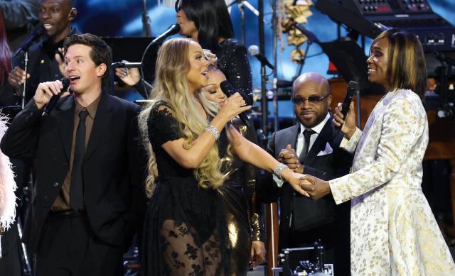(L-R) US singer-songwriter Charlie Puth, US singer-songwriter Mariah Carey, US producer Jermaine Dupri and US singer-actor Billy Porter perform on stage at the end of Musicares Person of the Year 2026 at the LA Convention Center in Los Angeles on January 30, 2026. (Photo by Michael Tran / AFP)