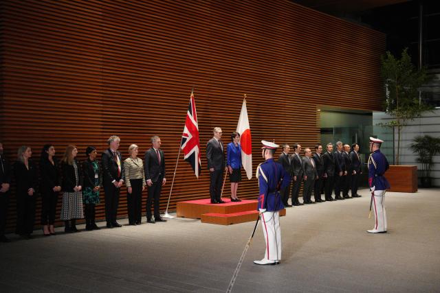 British Prime Minister Keir Starmer attends a ceremonial guard of honour with Japanese Prime Minister Sanae Takaichi at the Prime Minister's Office in Tokyo on January 31, 2026. (Photo by Carl Court / POOL / AFP)