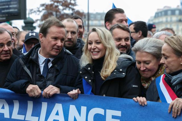 France's far-right party Debout La France (DLF) President Nicolas Dupont-Aignan (2nd-L), Right-wing European Conservatives and Reformists (ECR) MEP Marion Marechal (C),  Rassemblement National's MP Thibaut Monnier (3rd-R) and Rassemblement National's MP Anne Sicard (R) take part in a demonstration called by the union Alliance to denounce the lack of ressources in their corporation in Paris on January 31, 2026. (Photo by Alain JOCARD / AFP)