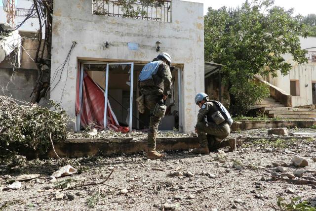 United Nations Spanish UNIFIL forces inspect chalets after the Israeli army reportedly booby-trapped and blew them up at dawn, on the outskirts of the town of al-Khiam, southern Lebanon on January 31, 2026. (Photo by Rabih DAHER / AFP)