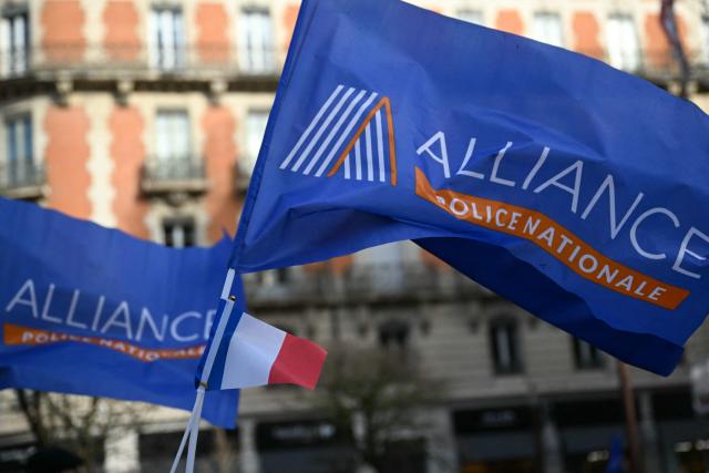 Alliance union flags are pictured during a demonstration called by the union Alliance Police Nationale to denounce the lack of ressources in their corporation in Toulouse, south of France on January 31, 2026. (Photo by Lionel BONAVENTURE / AFP)