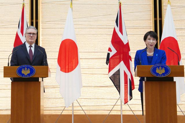 British Prime Minister Keir Starmer (L) and Japanese Prime Minister Sanae Takaichi take part in a joint press conference after their bilateral meeting at the Prime Minister's Office in Tokyo on January 31, 2026. (Photo by Carl Court / POOL / AFP)