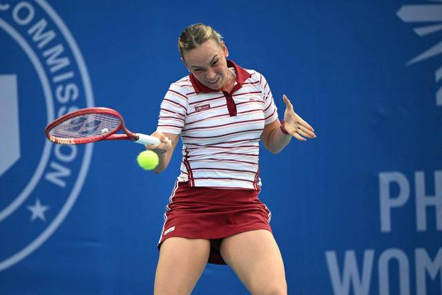 Donna Vekic of Croatia hits a return against Camila Osorio of Colombia during the women's singles finals at the Philippine Women's Open tennis tournament in Manila on January 31, 2026. (Photo by Ted ALJIBE / AFP)