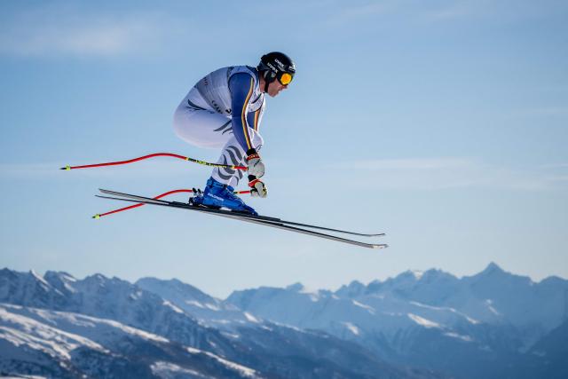 Germany's Romed Baumann takes part in the men's downhill training on the eve of the race during the FIS Alpine Ski World Cup 2025-2026, in Crans Montana, Switzerland, on January 31, 2026. (Photo by Fabrice COFFRINI / AFP)