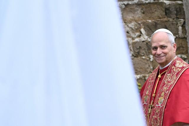 Pope Leo XIV arrives for the inauguration of the Marian mosaic of the Virgin Mary along with a statue of 16th-century Saint Rose of Lima during a ceremony in the Vatican Gardens, at the Vatican, on January 31, 2026. (Photo by Filippo MONTEFORTE / AFP)