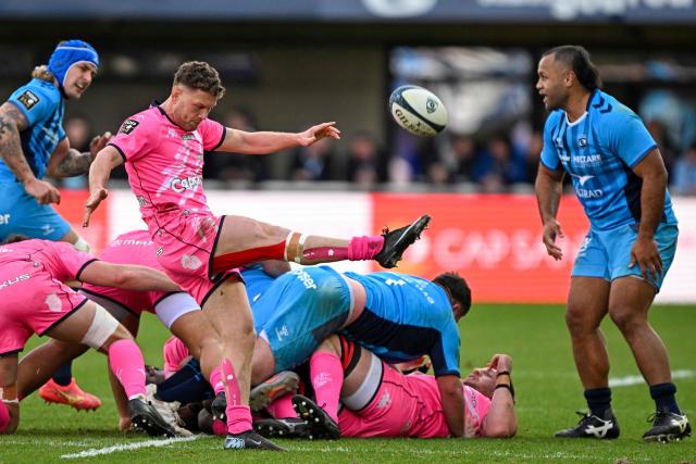 Stade Français' New Zealand scrum-half Tawera Kerr-Barlow kicks the ball during the French Top14 rugby union match between Montpellier Herault Rugby and Stade Francais Paris at the GGL Stadium in Montpellier, southern France on January 31, 2026. (Photo by Gabriel BOUYS / AFP)