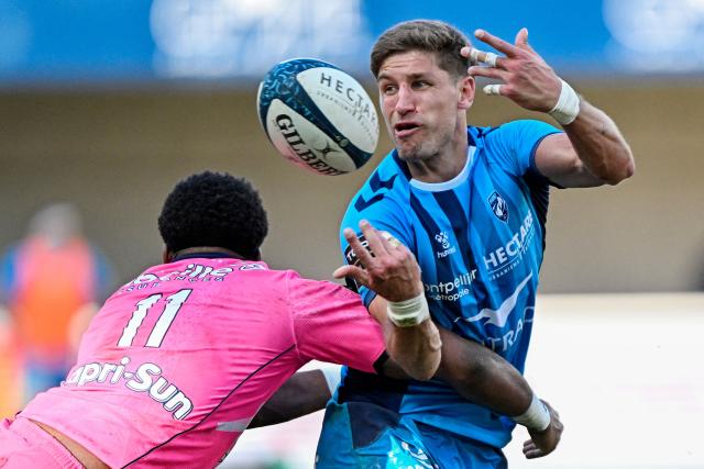 Montpellier’s Argentine fly-half Domingo Miotti passes the ball during the French Top 14 rugby union match between Montpellier Herault Rugby and Stade Francais at the Septeo Stadium in Montpellier, southern France on January 31, 2026. (Photo by Gabriel BOUYS / AFP)