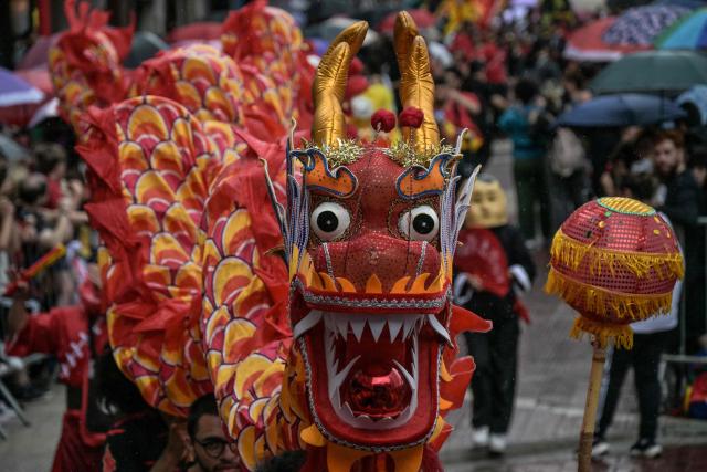 The dragon dance is performed during celebrations marking the Chinese Lunar New Year, which welcomes the Year of the Horse, in the Liberdade district of Sao Paulo, Brazil, on January 31, 2026. (Photo by Nelson ALMEIDA / AFP)