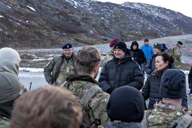 (From L) Chief of Danish Defense Michael Wiggers Hyldgaard, Denmark's Defense Minister Troels Lund Poulsen and Greenland's Foreign Minister Vivian Motzfeldt visit the army contribution in Nuuk, Greenland, on January 31, 2026. (Photo by Christian Klindt Soelbeck / Ritzau Scanpix / AFP) / Denmark OUT