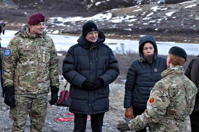 (From L) Chief of Danish Defense Michael Wiggers Hyldgaard, Denmark's Defense Minister Troels Lund Poulsen and Greenland's Foreign Minister Vivian Motzfeldt visit the army contribution in Nuuk, Greenland, on January 31, 2026. (Photo by Christian Klindt Soelbeck / Ritzau Scanpix / AFP) / Denmark OUT
