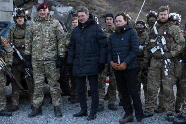 (From L) Chief of Danish Defense Michael Wiggers Hyldgaard, Denmark's Defense Minister Troels Lund Poulsen and Greenland's Foreign Minister Vivian Motzfeldt visit the army contribution in Nuuk, Greenland, on January 31, 2026. (Photo by Christian Klindt Soelbeck / Ritzau Scanpix / AFP) / Denmark OUT
