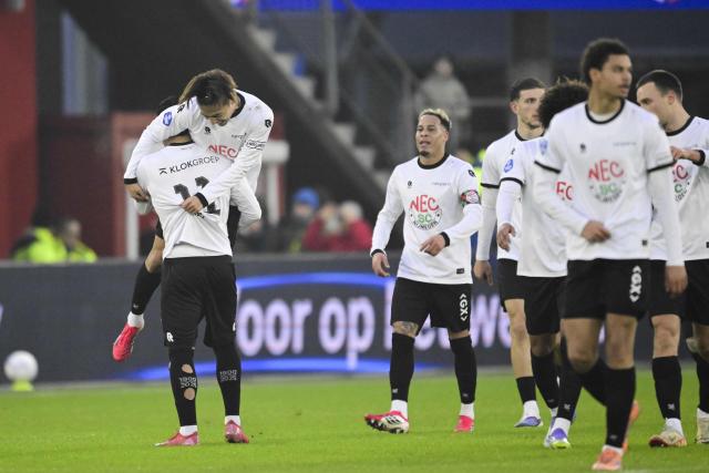 Basar Onal (L) of NEC Nijmegen celebrates with teammates scoring a goal during the Dutch Eredivisie football match between AZ Alkmaar and NEC at the AFAS Stadium in Alkmaar, Netherlands, on January 31, 2026. (Photo by Olaf Kraak / ANP / AFP) / Netherlands OUT