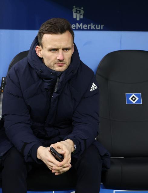 Hamburg's Director of Football Claus Costa looks on prior to the German first division Bundesliga football match between Hamburger SV and FC Bayern Munich in Hamburg, northern Germany on January 31, 2026. (Photo by Ibrahim OT / AFP) / DFL REGULATIONS PROHIBIT ANY USE OF PHOTOGRAPHS AS IMAGE SEQUENCES AND/OR QUASI-VIDEO