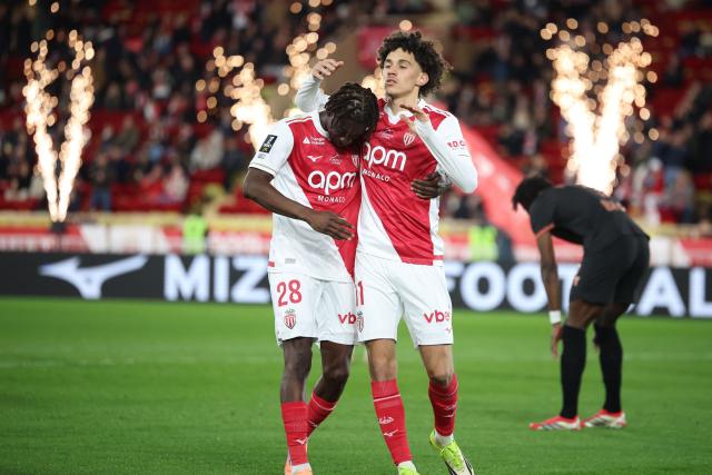 Monaco's French midfielder #11 Maghnes Akliouche (R) celebrates scoring his team's second goal during the French L1 football match between AS Monaco and Stade Rennais FC at the Louis II Stadium (Stade Louis II) in the Principality of Monaco on January 31, 2026. (Photo by Valery HACHE / AFP)
