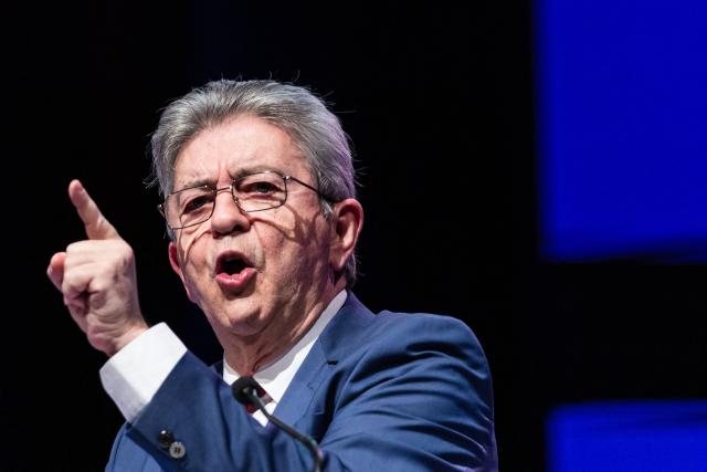 Founder of French left-wing La France Insoumise (LFI) party Jean-Luc Melenchon delivers a speech during a campaign rally in support of La France Insoumise - Nouveau Front Populaire's MP David Guiraud, candidate in the municipal elections in Roubaix, northern France, on January 31, 2026. (Photo by Sameer Al-DOUMY / AFP)