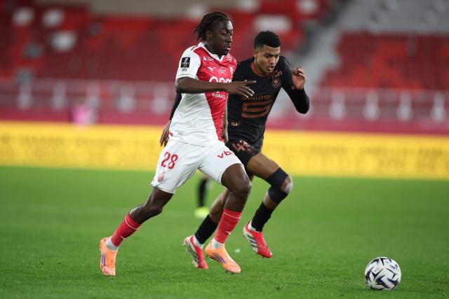 Monaco's French midfielder #28 Mamadou Coulibaly (L) fights for the ball with Rennes' Moroccan defender #48 Abdelhamid Ait Boudlal during the French L1 football match between AS Monaco and Stade Rennais FC at the Louis II Stadium (Stade Louis II) in the Principality of Monaco on January 31, 2026. (Photo by Valery HACHE / AFP)