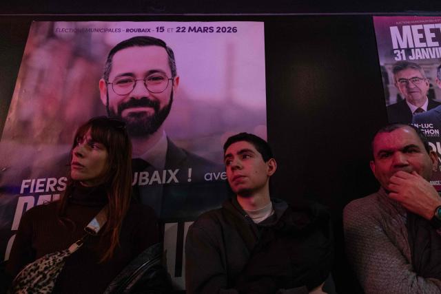 People attend a campaign rally in support of La France Insoumise - Nouveau Front Populaire's MP David Guiraud, a candidate in the municipal elections in Roubaix, northern France, on January 31, 2026. (Photo by Sameer Al-DOUMY / AFP)