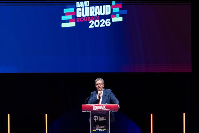 Founder of French left-wing La France Insoumise (LFI) party Jean-Luc Melenchon delivers a speech during a campaign rally in support of La France Insoumise - Nouveau Front Populaire's MP David Guiraud, candidate in the municipal elections in Roubaix, northern France, on January 31, 2026. (Photo by Sameer Al-DOUMY / AFP)