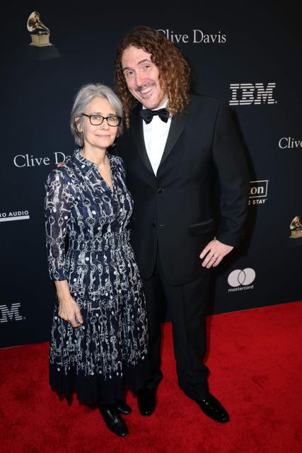 US musician and comedy actor "Weird Al" Yankovic and his wife Suzanne Yankovic attend the Recording Academy and Clive Davis' Salute To Industry Icons pre-Grammy gala at the Beverly Hilton hotel in Beverly Hills, California on January 31, 2026. (Photo by Patrick T. Fallon / AFP)