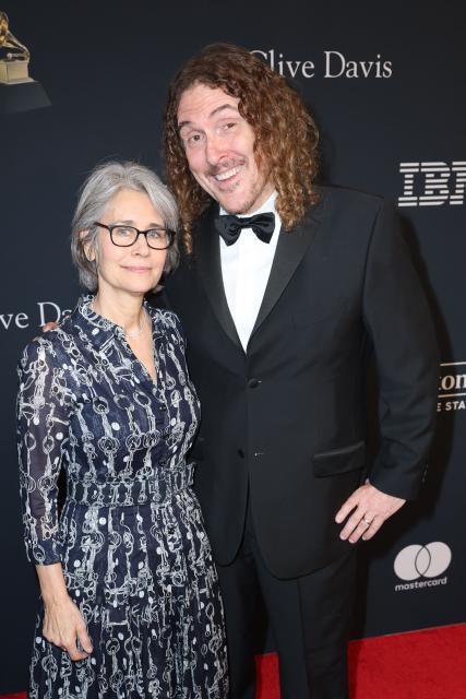 US musician and comedy actor "Weird Al" Yankovic and his wife Suzanne Yankovic attend the Recording Academy and Clive Davis' Salute To Industry Icons pre-Grammy gala at the Beverly Hilton hotel in Beverly Hills, California on January 31, 2026. (Photo by Patrick T. Fallon / AFP)
