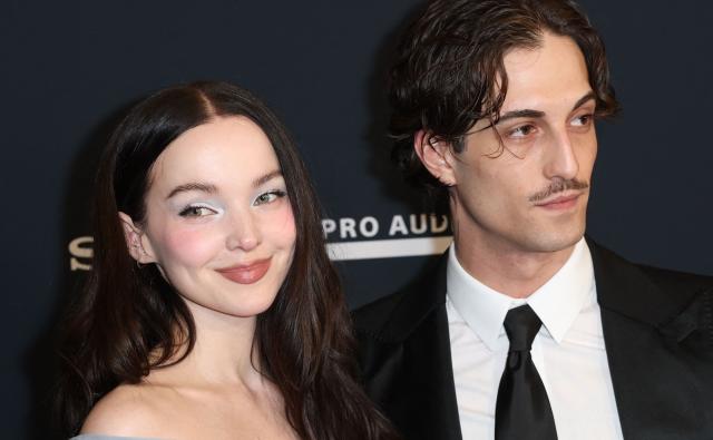 US singer Dove Cameron and Italian singer and songwriter Damiano David attend the Recording Academy and Clive Davis' Salute To Industry Icons pre-Grammy gala at the Beverly Hilton hotel in Beverly Hills, California on January 31, 2026. (Photo by Patrick T. Fallon / AFP)