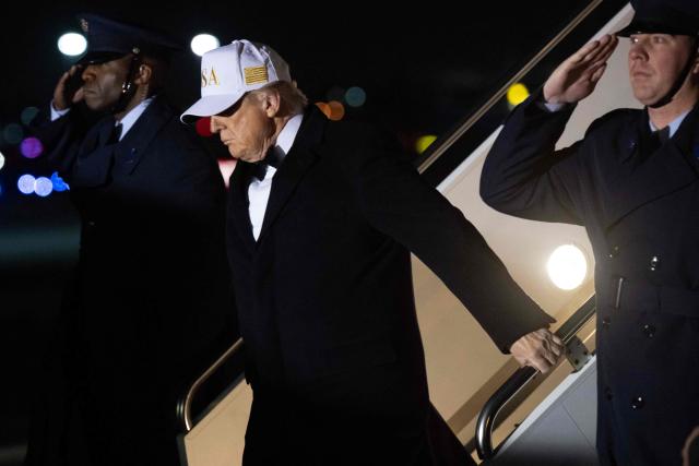 US President Donald Trump disembarks from Air Force One upon arrival at Palm Beach International Airport in West Palm Beach, Florida, on January 31, 2026. (Photo by SAUL LOEB / AFP)