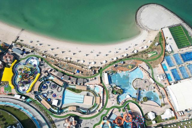 This aerial view shows the Aqua Park in Kuwait City on February 1, 2026. (Photo by YASSER AL-ZAYYAT / AFP)