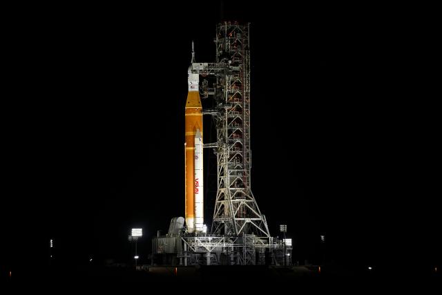 The Space Launch System (SLS) rocket and the Orion spacecraft, integrated for the Artemis II mission, are seen at Launch Pad 39B at the Kennedy Space Center in Cape Canaveral, Florida, on February 1, 2026 ahead of the first crewed mission to the Moon in more than 50 years. (Photo by Miguel J. Rodriguez Carrillo / AFP)