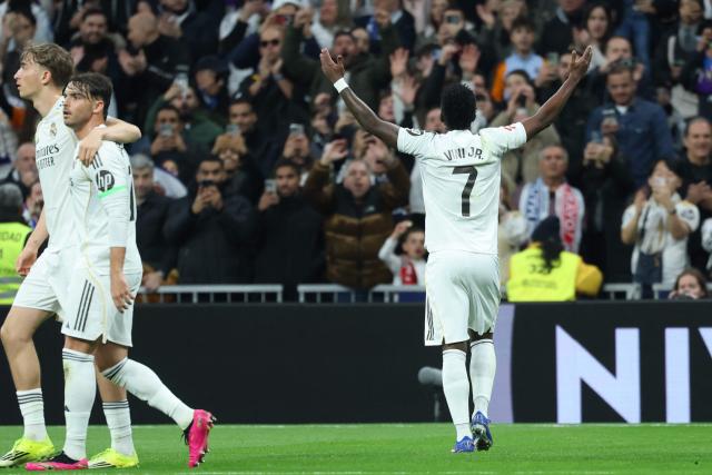 Real Madrid's Brazilian forward #07 Vinicius Junior celebrates scoring the opening goal during the Spanish league football match between Real Madrid CF and Rayo Vallecano at the Santiago Bernabeu stadium in Madrid on February 1, 2026. (Photo by Thomas COEX / AFP)