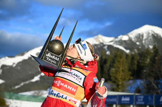 Norway's Ida Marie Hagen poses with her trophy after winning the Women's Individual Gundersen Norman Hill HS109/7,5km event of the FIS Nordic Combined World Cup in Seefeld, Austria, on February 1, 2026. (Photo by BARBARA GINDL / APA / AFP) / Austria OUT