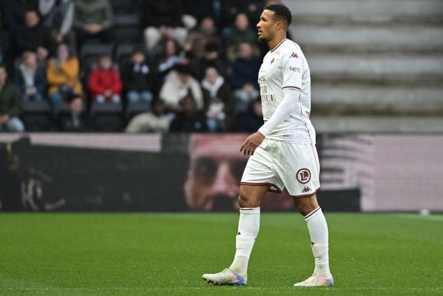 Metz's Ivorian midfielder #05 Jean-Philippe Gbamin reacts as he leaves the pitch following a red card during the French L1 football match between SCO Angers and FC Metz at the Stade Raymond-Kopa in Angers on February 1, 2026. (Photo by Damien Meyer / AFP)