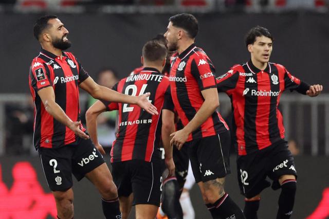 Nice's Tunisian defender #02 Ali Abdi (L) celebrates after scoring a goal during the French L1 football match between OGC Nice and Stade Brestois 29 (Brest) at the Allianz Riviera Stadium in Nice, south-eastern France, on February 1, 2026.  (Photo by Valery HACHE / AFP)