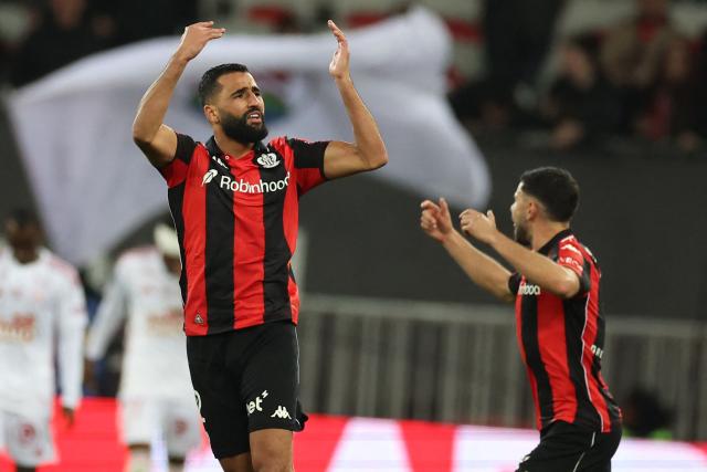 Nice's Tunisian defender #02 Ali Abdi (L) celebrates after scoring a goal during the French L1 football match between OGC Nice and Stade Brestois 29 (Brest) at the Allianz Riviera Stadium in Nice, south-eastern France, on February 1, 2026.  (Photo by Valery HACHE / AFP)