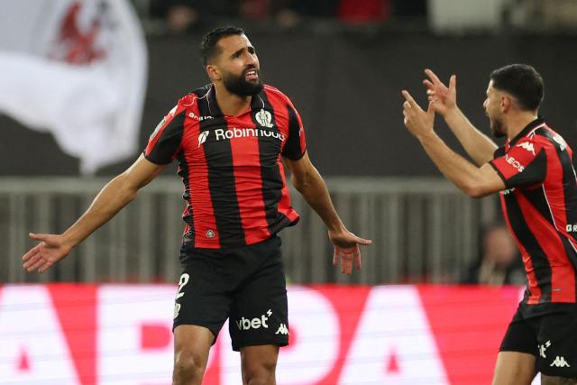 Nice's Tunisian defender #02 Ali Abdi (L) celebrates after scoring a goal during the French L1 football match between OGC Nice and Stade Brestois 29 (Brest) at the Allianz Riviera Stadium in Nice, south-eastern France, on February 1, 2026.  (Photo by Valery HACHE / AFP)