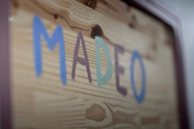 This photograph shows a wooden board in the house MADEO, an experimental place of welcome for children with psycho troubles in Milizac-Guipronvel, western France on January 21, 2026. They are known as the “unplaceables”: a handful of teenagers in the care of child welfare services (ASE) whose foster families no longer want them. Near Brest, an experimental program called “Maison Madeo” is attempting to provide them with stability and peace of mind. (Photo by Fred TANNEAU / AFP)