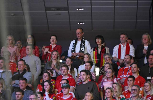 German Chancellor Friedrich Merz (back row C), his wife Charlotte Merz  (3R), Danish Prime Minister Mette Frederiksen (3L) and Queen Mary of Denmark watch from the stands the Men's EHF Euro 2026 final handball match Denmark vs Germany in Herning, Denmark, on February 1, 2026. (Photo by Jonathan Nackstrand / AFP)