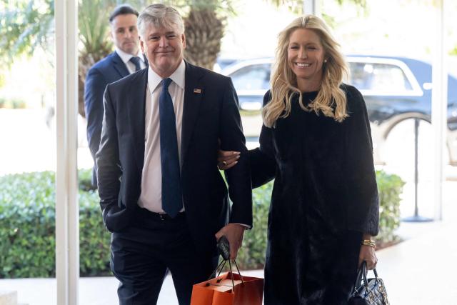 (L/R) Fox News host Sean Hannity and his fiance, Fox News host Ainsley Earhardt, arrive to attend the wedding of Dan Scavino, White House Deputy Chief of Staff, and Erin Elmore, the Department of State Director of Art in Embassies, at Mar-a-Lago in Palm Beach, Florida, February 1, 2026. (Photo by SAUL LOEB / AFP)