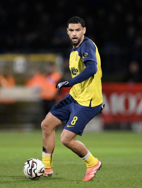 Royale Union Saint-Gilloise's Algerian midfielder #08 Adem Zorgane runs with the ball during the Belgian Pro League football match between Royale Union Saint-Gilloise and Club Brugge at the Joseph-Marien Stadium in Brussels on February 1, 2026. (Photo by JOHN THYS / Belga / AFP) / Belgium OUT