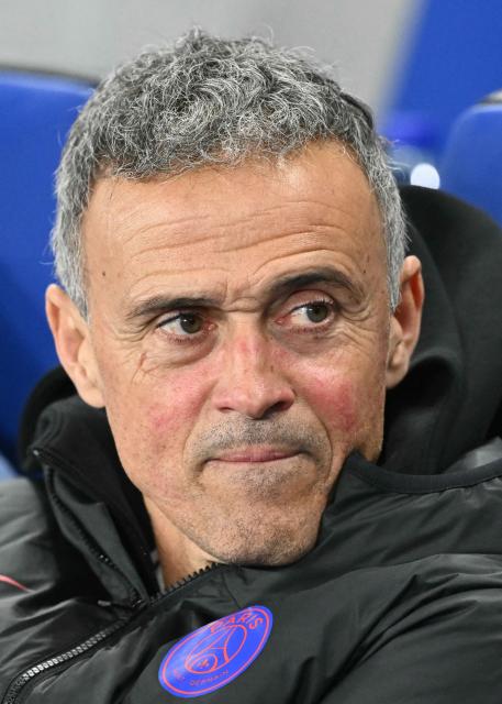 Paris Saint-Germain's Spanish headcoach Luis Enrique reacts during the French L1 football match between RC Strasbourg Alsace and Paris Saint-Germain (PSG) at the Stade de la Meinau in Strasbourg, eastern France, on February 1, 2026. (Photo by SEBASTIEN BOZON / AFP)