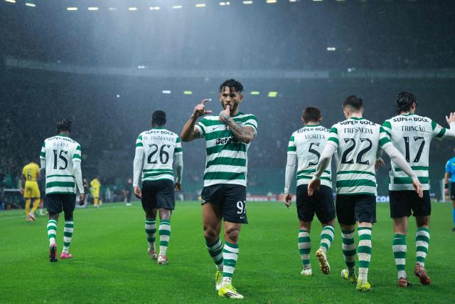 Sporting Lisbon's Colombian forward #97 Luis Suarez celebrates scoring his team's second goal during the Portuguese League football match between Sporting CP and CD Nacional da Madeira at the Jose Alvalade stadium in Lisbon on February 1, 2026. (Photo by PATRICIA DE MELO MOREIRA / AFP)