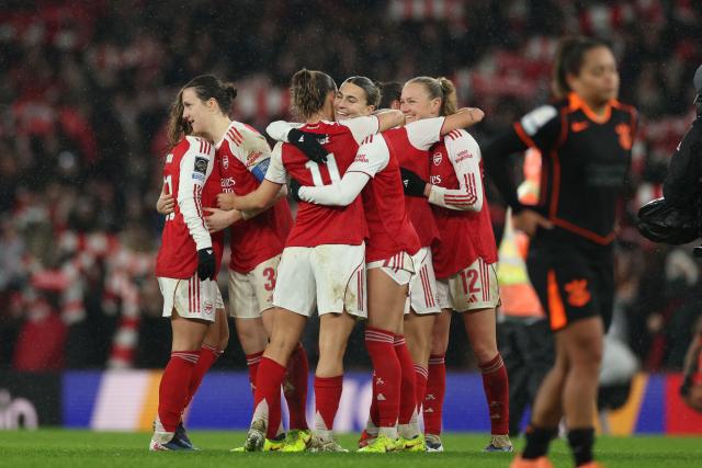 Arsenal players celebrate at the end of extra time in the FIFA Women's Champions Cup final football match between Arsenal and Corinthians at the Emirates Stadium in London on February 1, 2026. Arsenal won the game 3-2 after extra time. (Photo by Adrian Dennis / AFP)