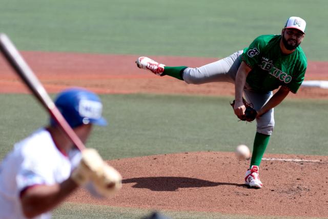 Mexico's #40 David Reyes pitches in the bottom of the first inning during the first game of the Caribbean Series baseball tournament between Mexico's Tomateros de Culiacan and Puerto Rico's Cangrejeros de Santurce at the Panamerican Stadium in Jalisco, Mexico on February 1, 2026. (Photo by Ulises Ruiz / AFP)