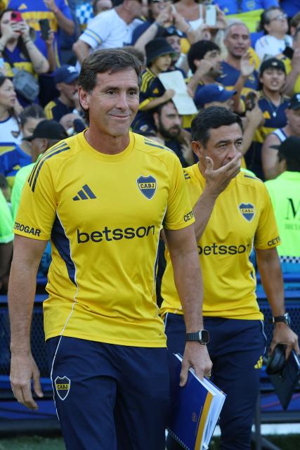 Boca Juniors' head coach Claudio Ubeda enters the pitch before the Argentine Professional Football League 2026 Apertura Tournament match between Boca Juniors and Newell's Old Boys at La Bombonera stadium in Buenos Aires on February 1, 2026. (Photo by ALEJANDRO PAGNI / AFP)