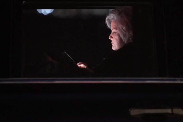White House Chief of Staff Susie Wiles sits in a vehicle while looking at her phone after traveling with US President Donald Trump onboard Air Force One at Joint Base Andrews in Maryland, February 1, 2026, as Trump returns from Palm Beach, Florida. (Photo by SAUL LOEB / AFP)